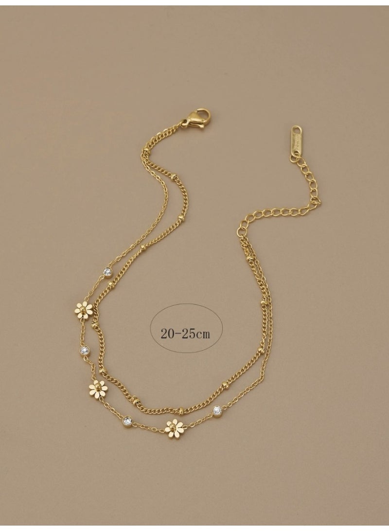 veya A Refined Stainless Steel Anklet Featuring A Sparkling Daisy Charm With Rhinestones, Designed For A Lasting Feminine Look - Image 2